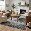 Grey and black boho abstract pattern washable area rug in a cozy farmhouse living room